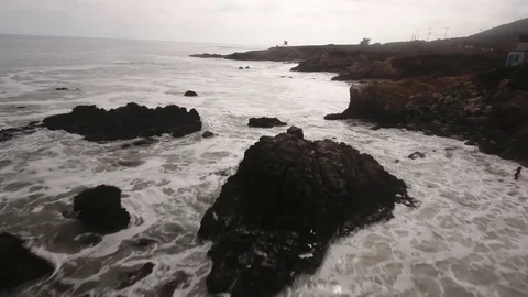 Fly Over Beach Rocks Aerial Video stock 82632925