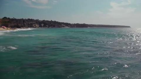Fly over the beach with stunning ocean views Stock Footage 145805676
