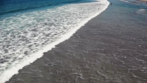 Fly over the beach with stunning ocean views Stock Footage 145807112