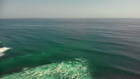 Fly over the beach with stunning ocean views Stock Footage 145807746