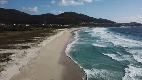 FLY OVER THE BEACH SUNNY DAY WAVES Stock Footage 99830213