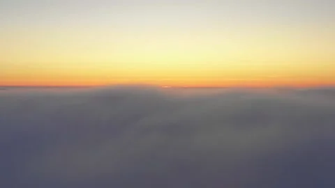 Fly over beautiful white clouds with first sun rays. Stock Footage 142740809