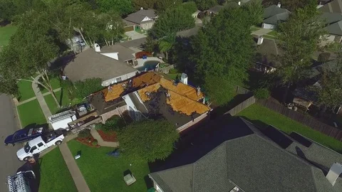 Fly Over Birds Eye View of Home Renovation Improvement Roofing Drone Stock Footage 85393428