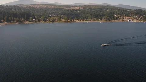 Fly over a boat coming in to dock Stock Footage 87797523