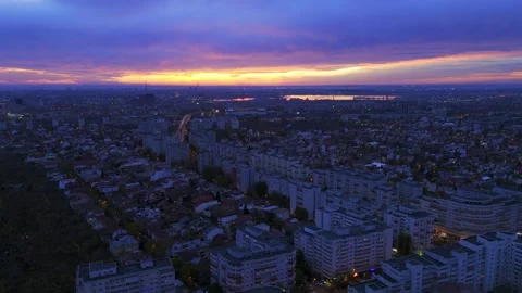 Fly over Bucharest City at night sunset with traffic on main boulevard. Stock-Footage 257268770