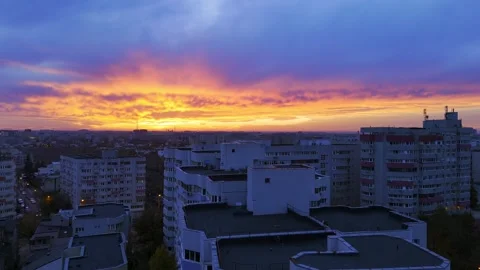 Fly over Bucharest City at night sunset with traffic on main boulevard. Video stock 257294716