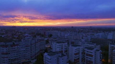 Fly over Bucharest City at night sunset with traffic on main boulevard. Video stock 257295778