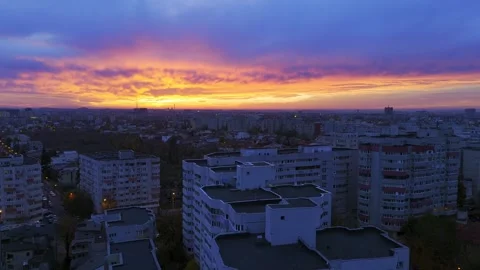 Fly over Bucharest City at night sunset with traffic on main boulevard. Stock Footage 257298823