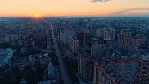 Fly over the city waking dawn Stock Footage 129676437