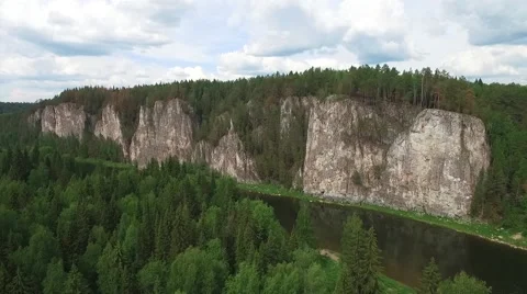 Fly over cliff. cliff like wall. long cliff near water 스톡 동영상 65318974