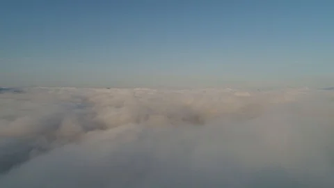 Fly over the clouds (fly down) Stock Footage