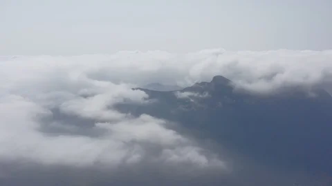 Fly over cloudscape in overcast daytime, Ma On Shan, Hong Kong Stock-Footage 126135408