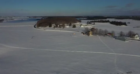Fly over countryside in winter Video stock 151550732