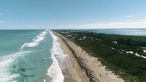 Fly over crowded beach in South Fla Stock Footage 103284545