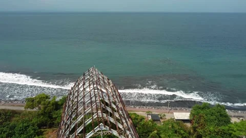 Fly over destructed building to ocean abandoned Stock Footage 154566871
