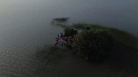 Fly over drone shot kayaking in Varkala India Stock Footage 256651869