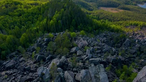 Fly Over The Edge Of The Cliff With Large Rocks At Buttom 4K Areal Stock Footage 249905665