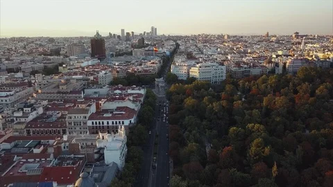 Fly over the evening Madrid with a view of the house and the road Stock Footage 78385741