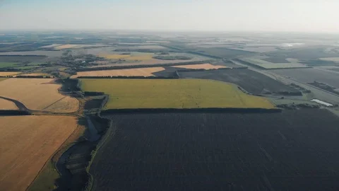 Fly over farm fields and black earth Stock Footage 118160210