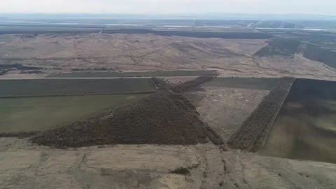 Fly over fields near the mountain Stock Footage 153438965