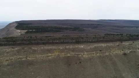 Fly over the flat plateau of the mountain in an autumn day Stock Footage 153436859