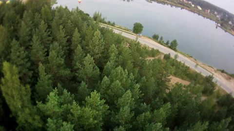 Fly over forest and road Stock-Footage 1016480