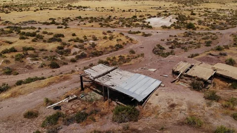 Fly Over Ghost Town in the Nevada Desert - Aerial Drone Stock Footage 114485471