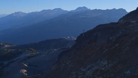Fly Over High Alpine Peak with Mountains in the Distance 動画素材 82325667