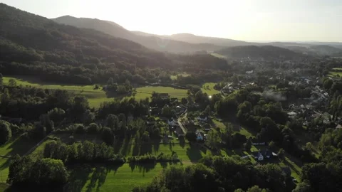 Fly-by Over a Hilly Countryside Stock Footage 152864011