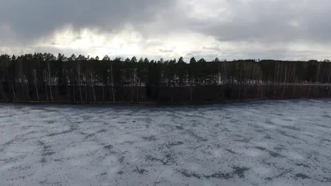 Fly over ice. Aerial view of frozen lake in Finland Stock Footage 134790618