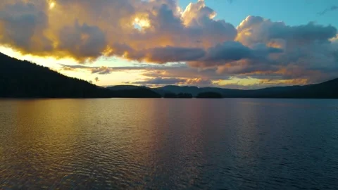 Fly Over The Lake With Colourful Clouds And Beautiful Reflections Stock Footage 249904911