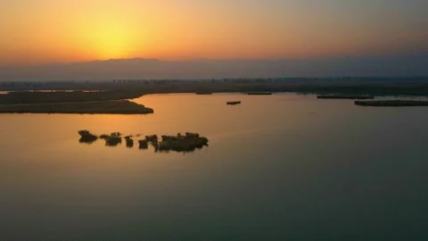 Fly over the lake at dusk Stock Footage 259379422