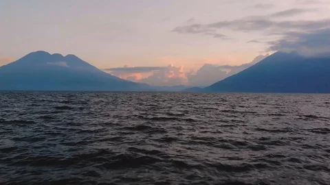 Fly Over Lake to Valley at Sunset Stock Footage 122846189
