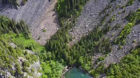Fly over Lindeman Lake in British Columbia Stock Footage 200925951