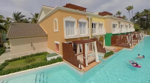 Fly over a luxury beach front condo Stock Footage 54405194