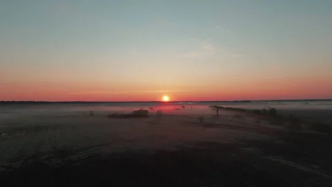 Fly over magnificent fields covered with thick fog clouds. Beautiful nature Stock Footage 158230426