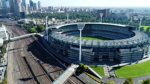 Fly over the mighty MCG, Melbourne. Train tracks in foreground Stock Footage 152173753