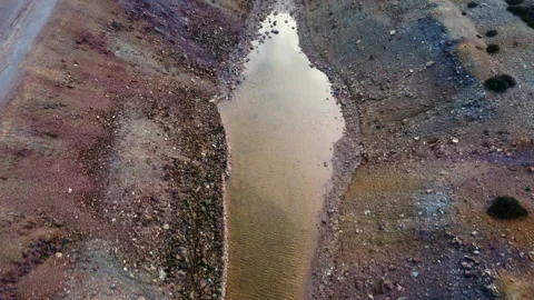Fly over Mount Perry open pit copper mine Wales 8 Stock Footage 233496951
