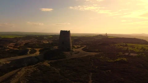 Fly over Mount Perry open pit copper mine 12 with orbit of abandoned windmill Stock Footage 233560792