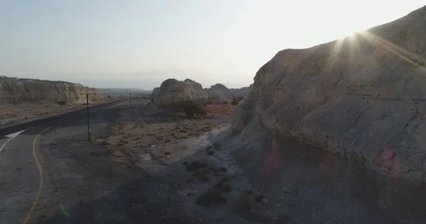 A fly by over the mountain ridge in the desert 4K Stock Footage 106349935