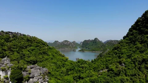 Fly over mountains at halong bay 4K Stock Footage 121993553