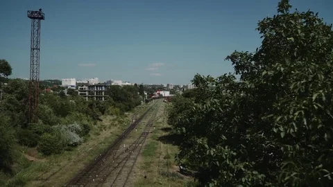 A fly over an old railway system in a post soviet town. Stock Footage 77155432