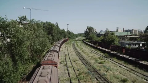 A fly over an old railway system in a post soviet town. Stock Footage 77155454