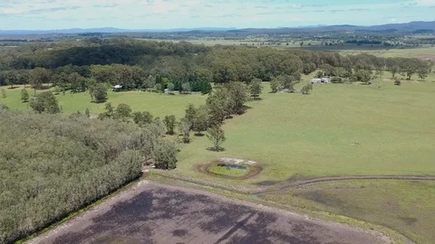 Fly Over Paddock to Farm Quick Stock Footage 83932443
