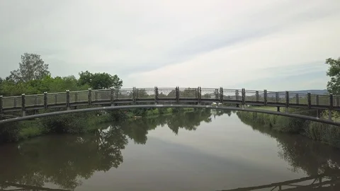 Fly over a pedestrian bridge Stock Footage 129311647