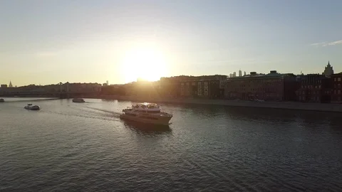 Fly over the pleasure craft on sunset over the Moscow river Stock Footage 129831599