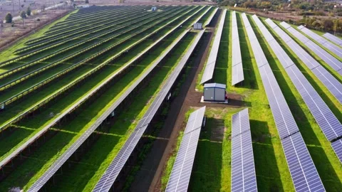 Fly over a renewable solar power plant with sun in Ukraine Stock Footage 145660911