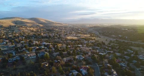 Fly over retirement community in small Northern Arizona town at sunrise Stock Footage 131403842