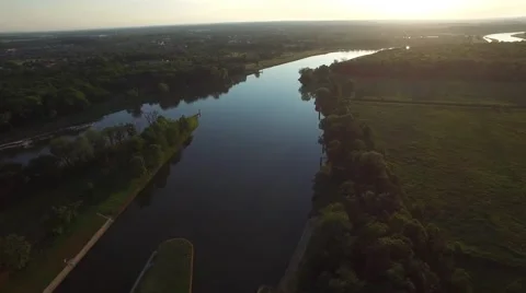 Fly over the river in the sunset light Stock Footage 63996270
