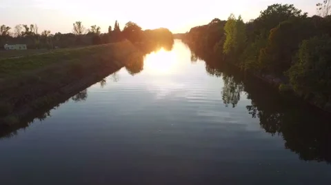 Fly over the river in the sunset light Stock Footage 67834777